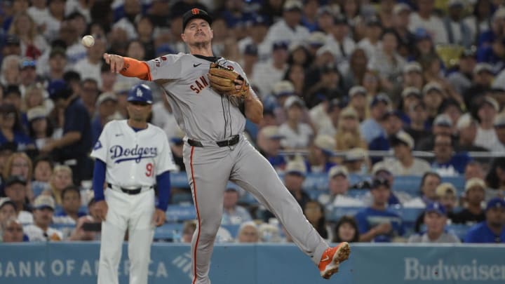 Jul 22, 2024; Los Angeles, California, USA;  San Francisco Giants third baseman Matt Chapman (26) makes a play against the Los Angeles Dodgers in the sixth inning at Dodger Stadium.