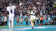 Ravens wide receivers Rashod Bateman and Zay Flowers celebrate a touchdown during the third quarter at Hard Rock Stadium.