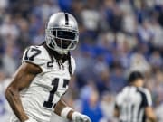 Las Vegas Raiders wide receiver Davante Adams (17) celebrates a touchdown.