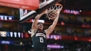 Nov 21, 2025; Houston, Texas, USA; Houston Rockets guard Reed Sheppard (15) dunks the ball during the second quarter against the Denver Nuggets at Toyota Center. Mandatory Credit: Troy Taormina-Imagn Images