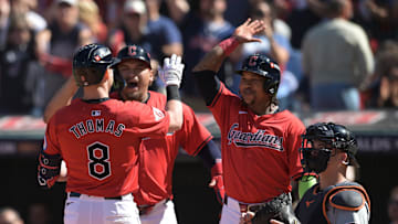 Oct 5, 2024; Cleveland, OH, USA; Cleveland Guardians outfielder Lane Thomas (8) celebrates with teammates after hitting a three-run home run against the Detroit Tigers in the first inning in game one of the ALDS for the 2024 MLB Playoffs at Progressive Field. 