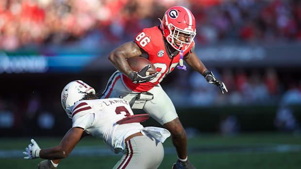 Georgia Bulldogs wide receiver Dillon Bell (86) is tackled by Mississippi State Bulldogs