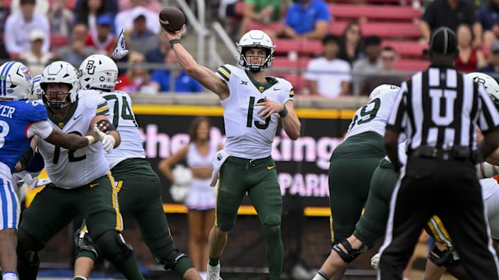 Sep 6, 2025; Dallas, Texas, USA; Baylor Bears quarterback Sawyer Robertson (13) passes the ball against the SMU Mustangs during the second half at Gerald J. Ford Stadium. Mandatory Credit: Jerome Miron-Imagn Images