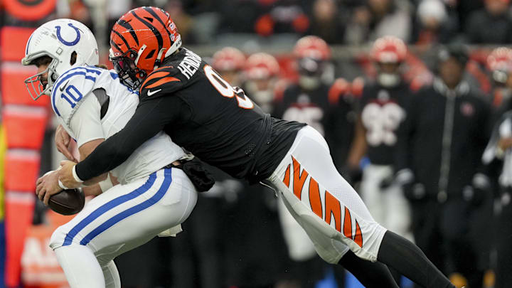 Dec 10, 2023; Cincinnati, Ohio, USA; Cincinnati Bengals defensive end Trey Hendrickson (91) sacks Indianapolis Colts quarterback Gardner Minshew II (10) at Paycor Stadium. Mandatory Credit: Jenna Watson-Imagn Images