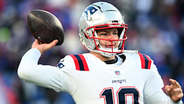 Dec 22, 2024; Orchard Park, New York, USA; New England Patriots quarterback Drake Maye (10) warms up before a game against the Buffalo Bills at Highmark Stadium. Mandatory Credit: Mark Konezny-Imagn Images