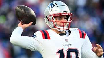 Dec 22, 2024; Orchard Park, New York, USA; New England Patriots quarterback Drake Maye (10) warms up before a game against the Buffalo Bills at Highmark Stadium. Mandatory Credit: Mark Konezny-Imagn Images