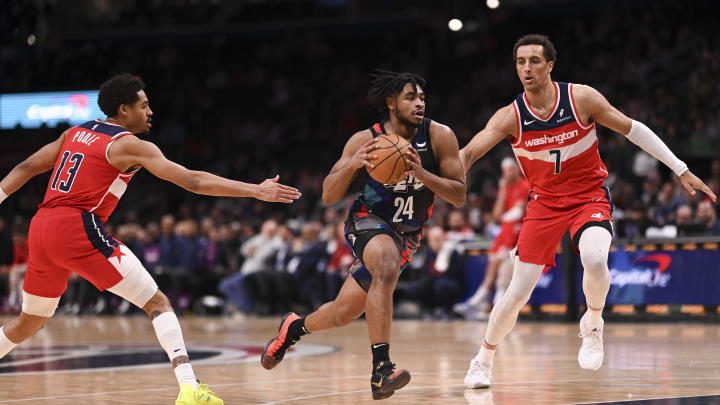 Mar 27, 2024; Washington, District of Columbia, USA;  Brooklyn Nets guard Cam Thomas (24) makes a move to the basket on Washington Wizards forward Patrick Baldwin Jr. (7) during the first half at Capital One Arena. Mandatory Credit: Tommy Gilligan-USA TODAY Sports