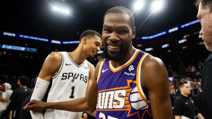 Nov 2, 2023; Phoenix, Arizona, USA; Phoenix Suns forward Kevin Durant (35) greets San Antonio Spurs center Victor Wembanyama (1)  following the game at Footprint Center. Mandatory Credit: Mark J. Rebilas-USA TODAY Sports