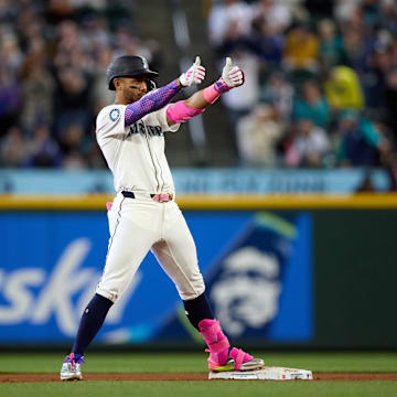 Seattle Mariners center fielder Julio Rodriguez celebrates after hitting a double against the New York Yankees on May 14 at T-Mobile Park.