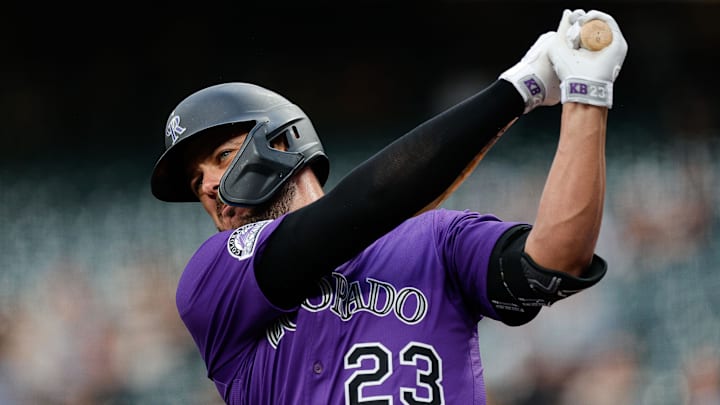 Apr 8, 2025; Denver, Colorado, USA; Colorado Rockies designated hitter Kris Bryant (23) on deck in the first inning against the Milwaukee Brewers at Coors Field. Mandatory Credit: Isaiah J. Downing-Imagn Images