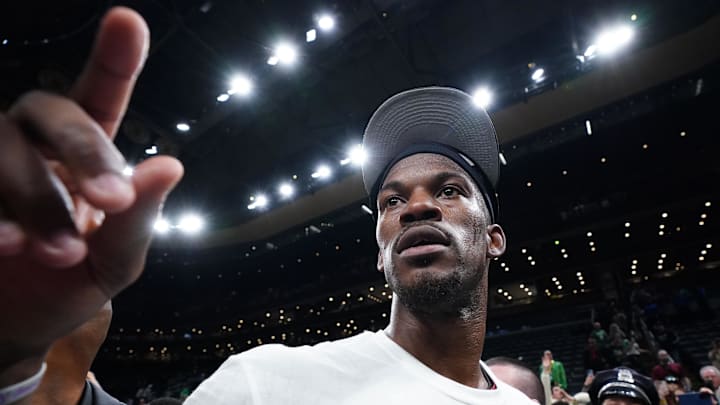 May 29, 2023; Boston, Massachusetts, USA; Miami Heat forward Jimmy Butler (22) celebrates after the Heat defeated the Boston Celtics in game seven of the Eastern Conference Finals for the 2023 NBA playoffs at TD Garden. Mandatory Credit: David Butler II-Imagn Images