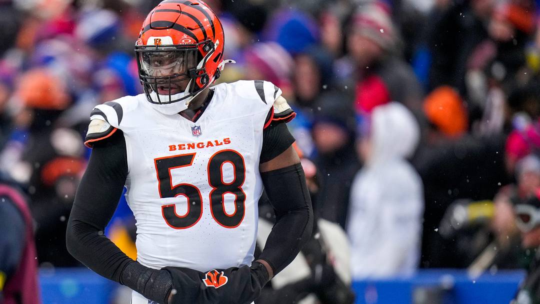 Cincinnati Bengals defensive end Joseph Ossai (58) walks for the locker room with trainers in the fourth quarter of the NFL Week 14 game between the Buffalo Bills and the Cincinnati Bengals at Highmark Stadium in Orchard Park, N.Y., on Sunday, Dec. 7, 2025. The Bills overcame a halftime deficit to win 39-34.