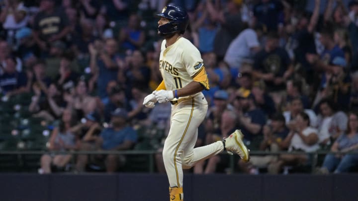 Jul 29, 2024; Milwaukee, Wisconsin, USA; Milwaukee Brewers outfielder Jackson Chourio (11) rounds the bases after hitting a home run against the Atlanta Braves in the eighth inning at American Family Field. Mandatory Credit: Michael McLoone-USA TODAY Sports