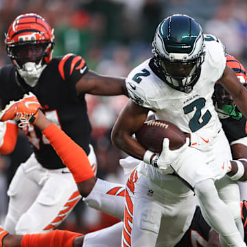 Aug 7, 2025; Philadelphia, Pennsylvania, USA; Philadelphia Eagles wide receiver Jahan Dotson (2) runs with the ball against Cincinnati Bengals safety Jordan Battle (27) after a catch during the first quarter at Lincoln Financial Field. 