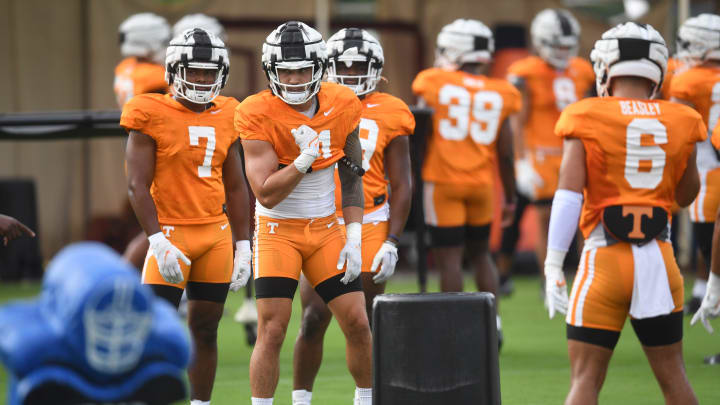 Tennessee linebacker Keenan Pili (11) participates in a drill during a Tennessee Football fall practice, Friday, Aug. 4, 2023.