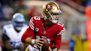 San Francisco 49ers quarterback Brock Purdy looks to pass the ball.