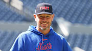Sep 11, 2024; Toronto, Ontario, CAN; New York Mets pitching coach Jeremy Hefner (65) walks towards the outfield wearing a City of New York Fire Department baseball cap during batting practice before a game against the Toronto Blue Jays at Rogers Centre. Mandatory Credit: Nick Turchiaro-Imagn Images