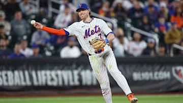 May 27, 2025; New York City, New York, USA; New York Mets second baseman Brett Baty (7) throws the ball to first base for an out during the ninth inning against the Chicago White Sox at Citi Field. Mandatory Credit: Vincent Carchietta-Imagn Images