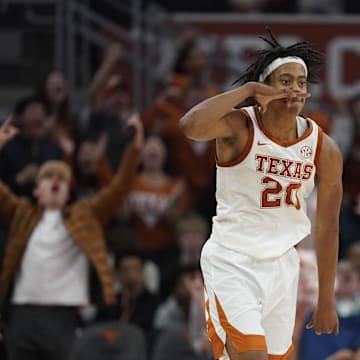 Jan 25, 2025; Austin, Texas, USA; Texas Longhorns guard Tre Johnson (20) reacts after scoring a three point basket during the second half against the Texas A&M Aggies at Moody Center. Mandatory Credit: Scott Wachter-Imagn Images