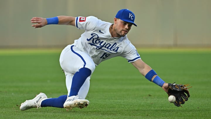 May 21, 2024; Kansas City, Missouri, USA; Kansas City Royals second baseman Michael Massey (19) reaches out for a ground ball in the fourth inning against the Detroit Tigers at Kauffman Stadium.