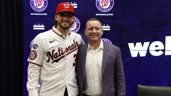 Jul 22, 2023; Washington, District of Columbia, USA; Washington Nationals first round draft pick outfielder Dylan Crews (L) and LSU head baseball coach Jay Johnson (R) pose for picture after an introductory press conference prior to the Nationals' game against the San Francisco Giants at Nationals Park. Mandatory Credit: Geoff Burke-USA TODAY Sports