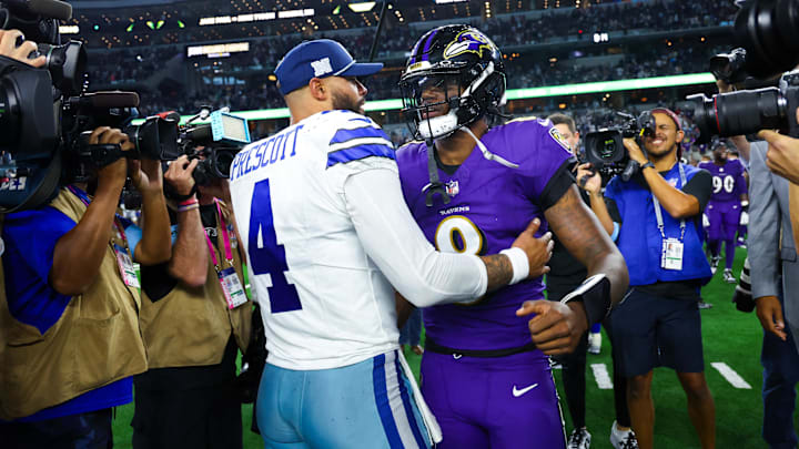 Sep 22, 2024; Arlington, Texas, USA; Dallas Cowboys quarterback Dak Prescott (4) hugs Baltimore Ravens quarterback Lamar Jackson (8) after the game at AT&T Stadium. Mandatory Credit: Kevin Jairaj-Imagn Images Sep 22, 2024; Arlington, Texas, USA; Dallas Cowboys quarterback Dak Prescott (4) hugs Baltimore Ravens quarterback Lamar Jackson (8) after the game at AT&T Stadium. Mandatory Credit: Kevin Jairaj-Imagn Images