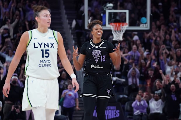 Golden State Valkyries center Iliana Rupert celebrates after scoring a basket as Minnesota Lynx forward Jessica Shepard.