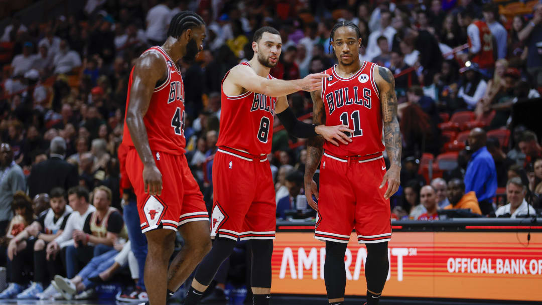 Dec 20, 2022; Miami, Florida, USA; Chicago Bulls guard Zach LaVine (8) talks to forward DeMar DeRozan (11) and forward Patrick Williams (44) during the fourth quarter against the Miami Heat at FTX Arena. 