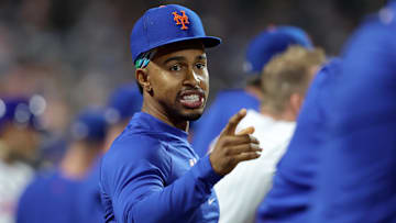Sep 16, 2024; New York City, New York, USA; New York Mets shortstop Francisco Lindor (12) talks to teammates in the dugout during the fifth inning against the Washington Nationals at Citi Field. Mandatory Credit: Brad Penner-Imagn Images