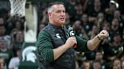 Dec 2, 2025; East Lansing, Michigan, USA;  Michigan State head football coach Pat Fitzgerald watches the Spartans defeat the Iowa Hawkeyes at Jack Breslin Student Events Center. Mandatory Credit: Dale Young-Imagn Images