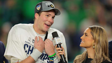 Jan 9, 2025; Miami, FL, USA; Notre Dame Fighting Irish quarterback Riley Leonard (13) celebrates defeating the Penn State Nittany Lions in the Orange Bowl at Hard Rock Stadium. Mandatory Credit: Sam Navarro-Imagn Images