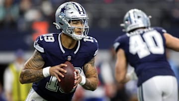 Jan 5, 2025; Arlington, Texas, USA; Dallas Cowboys quarterback Trey Lance (19) throws a pass against the Washington Commanders during the first quarter at AT&T Stadium. Mandatory Credit: Tim Heitman-Imagn Images