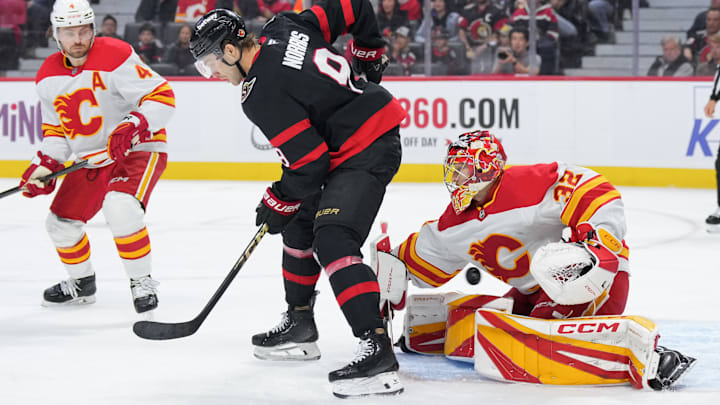 Dustin Wolf, Josh Norris