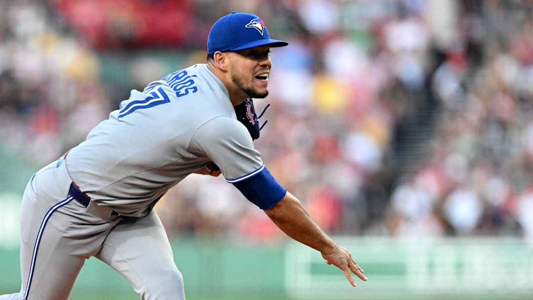 Jun 27, 2025; Boston, Massachusetts, USA; Toronto Blue Jays starting pitcher Jose Berrios (17) pitches against the Boston Red Sox during the first inning at Fenway Park. 