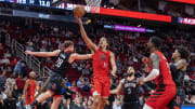 Jan 24, 2024; Houston, Texas, USA; Portland Trail Blazers guard Malcolm Brogdon (11) shoots against Houston Rockets center Alperen Sengun (28) in overtime at Toyota Center. Mandatory Credit: Thomas Shea-USA TODAY Sports