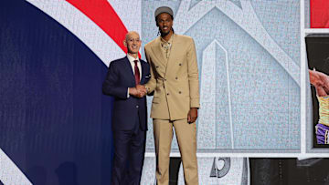 Jun 26, 2024; Brooklyn, NY, USA; Alexander Sarr poses for photos with NBA commissioner Adam Silver after being selected in the first round by the Washington Wizards in the 2024 NBA Draft at Barclays Center. Mandatory Credit: Brad Penner-Imagn Images
