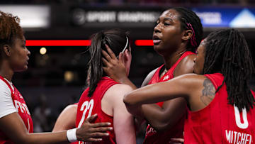 Sep 13, 2024; Indianapolis, Indiana, USA; Indiana Fever forward Aliyah Boston (7) comforts Indiana Fever guard Caitlin Clark (22) after a foul call Friday, Sept. 13, 2024, during a game between the Indiana Fever and the Las Vegas Aces on Friday, Sept. 13, 2024, at Gainbridge Fieldhouse in Indianapolis. Mandatory Credit:  Grace Smith/USA TODAY Network via Imagn Images