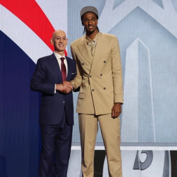 Jun 26, 2024; Brooklyn, NY, USA; Alexander Sarr poses for photos with NBA commissioner Adam Silver after being selected in the first round by the Washington Wizards in the 2024 NBA Draft at Barclays Center. Mandatory Credit: Brad Penner-USA TODAY Sports