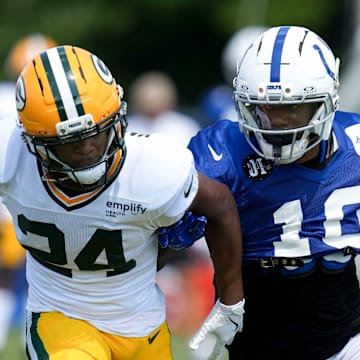 Green Bay Packers cornerback Carrington Valentine (24) goes against Indianapolis Colts wide receiver Adonai Mitchell.