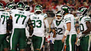 Sep 9, 2024; Santa Clara, California, USA; New York Jets guard John Simpson (76), New York Jets offensive tackle Tyron Smith (77), New York Jets tight end Tyler Conklin (83), New York Jets wide receiver Xavier Gipson (82), New York Jets quarterback Aaron Rodgers (8), and New York Jets running back Breece Hall (20) in the huddle against the San Francisco 49ers in the fourth quarter at Levi's Stadium. 