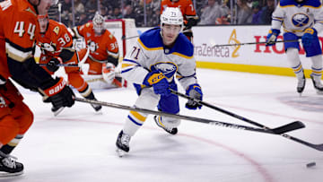 Nov 22, 2024; Anaheim, California, USA; Buffalo Sabres center Ryan McLeod (71) vies for the puck against Anaheim Ducks left wing Ross Johnston (44) during the first period at Honda Center. Mandatory Credit: Ryan Sun-Imagn Images