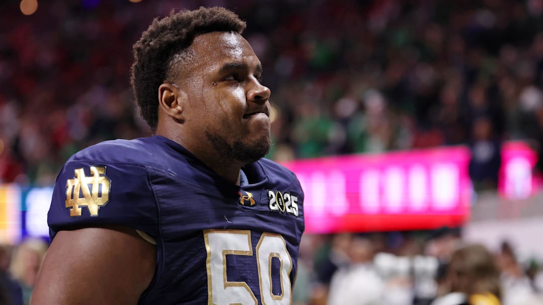 Jan 20, 2025; Atlanta, GA, USA; Notre Dame Fighting Irish offensive lineman Aamil Wagner (59) reacts after losing against the Ohio State Buckeyes in the CFP National Championship college football game at Mercedes-Benz Stadium. Mandatory Credit: Brett Davis-Imagn Images