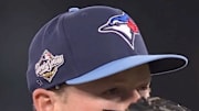 Blue Jays reliever Louis Varland and the rest of the Toronto bullpen wore Vesia's No. 51 on their caps as a tribute to the Dodgers reliever. 