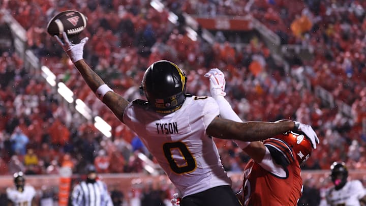Oct 11, 2025; Salt Lake City, Utah, USA; Arizona State Sun Devils wide receiver Jordyn Tyson (0) and Utah Utes cornerback Smith Snowden (2) battle for a passed ball during the second quarter at Rice-Eccles Stadium. Mandatory Credit: Rob Gray-Imagn Images