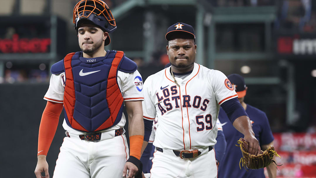 Sep 20, 2025; Houston, Texas, USA; Houston Astros starting pitcher Framber Valdez (59) walks on the field with catcher Yainer Diaz (21) before the game against the Seattle Mariners at Daikin Park. Mandatory Credit: Troy Taormina-Imagn Images