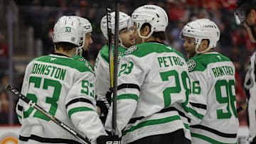 Apr 14, 2025; Detroit, Michigan, USA; The Dallas Stars celebrate a goal in the first period against the Detroit Red Wings at Little Caesars Arena. Mandatory Credit: Brian Bradshaw Sevald-Imagn Images
