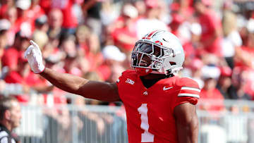 Sep 6, 2025; Columbus, Ohio, USA;  Ohio State Buckeyes cornerback Davison Igbinosun (1) celebrates his pass break up during the second quarter against the Grambling State Tigers at Ohio Stadium. Mandatory Credit: Joseph Maiorana-Imagn Images