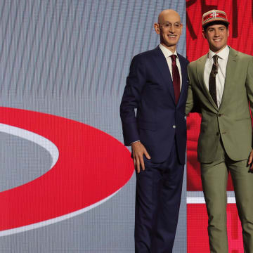 Jun 26, 2024; Brooklyn, NY, USA; Reed Sheppard poses for photos with NBA commissioner Adam Silver after being selected in the first round by the Houston Rockets in the 2024 NBA Draft at Barclays Center. Mandatory Credit: Brad Penner-USA TODAY Sports