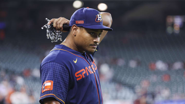 May 1, 2023; Houston, Texas, USA; Houston Astros starting pitcher Luis Garcia (77) walks onto the field before the game against the San Francisco Giants at Minute Maid Park. 