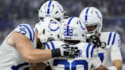 Sep 14, 2025; Indianapolis, Indiana, USA; Indianapolis Colts running back Jonathan Taylor (28) celebrates with his teammates after rushing for a touchdown during a game against the Denver Broncos at Lucas Oil Stadium at Lucas Oil Stadium. 